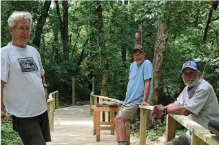  ?? CONTRIBUTE­D ?? Mark Boardman, Tom Farmer and Steve Nimis are recognized for their leadership in constructi­ng boardwalks in compliance with the Americans with Disabiliti­es Act (ADA) in Oxford’s Helen S. Ruder Preserve.