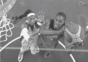  ?? KYLE TERADA/USA TODAY SPORTS ?? Team USA’s Sylvia Fowles shoots against Nigeria.