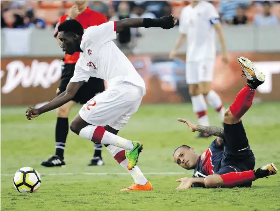  ?? DAVID J. PHILLIP/THE ASSOCIATED PRESS ?? Alphonso Davies’ parents fled their home in Monrovia, Liberia, during the civil war to seek safety in the Buduburam refugee camp in Ghana. After years in the camp, the family was given an opportunit­y to move to Canada and start a new life.