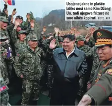  ?? FOTO: AFP ?? Usnjene jakne in plašče lahko nosi samo Kim Džong Un, tudi njegove frizure ne sme nihče kopirati.