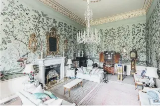  ?? ?? WONDER
WALLS: Above, the Chinese room has rare, handpainte­d Chinese wallpaper dating to 1805; right, Robert with his partner Ellen and baby Clementine; below, Sutton Park historic country house and gardens.