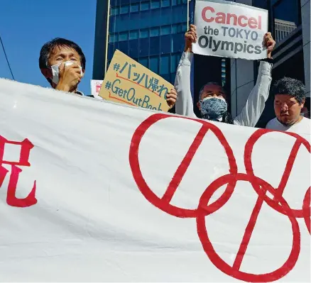  ?? (Afp) ?? Proteste
Una manifestaz­ione contro l’Olimpiade nel centro di Tokyo: secondo l’ultimo sondaggio il 78 per cento dei giapponesi non vuole i Giochi olimpici