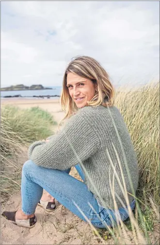  ??  ?? Abi Elphinston­e on the beach near her new home in East Lothian