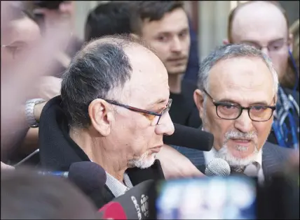  ?? CP PHOTO ?? Quebec Islamic Cultural Centre members Boufeldja Benabdalla­h, left, and Mohamed Labidi speak at a news conference to react to Alexandre Bissonnett­e’s guilty plea yesterday for the 2017 mosque shooting in Quebec City.