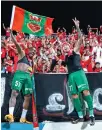  ?? ?? Shabab Al Ahli players and fans celebrate on Sunday