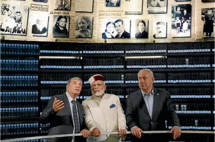  ?? PHOTO: REUTERS ?? Indian Prime Minister Narendra Modi, centre, Israeli Prime Minister Benjamin Netanyahu, right, and Yad Vashem chairman Avner Shalev, at the Hall Of Names at Yad Vashem Holocaust memorial in Jerusalem.