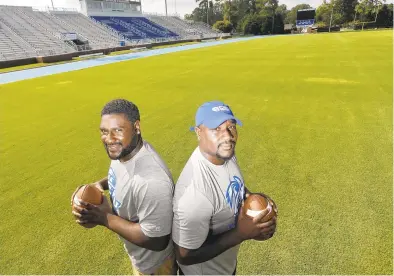  ?? JONATHON GRUENKE/DAILY PRESS ?? Defensive end Julien Spence, left, and linebacker Jamal Spence are senior twins on the Christophe­r Newport football team.