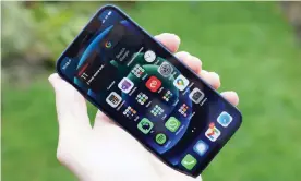  ??  ?? The iPhone 12 mini is the small flagship phone many may have been waiting for, which is easy to hold, use one-handed and pocket. Photograph: Samuel Gibbs/The Guardian