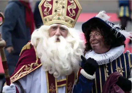  ?? FOTO WIM HENDRIX ?? Sinds 2015 is de roetveegpi­et erbij als Sinterklaa­s voet aan wal zet in Antwerpen