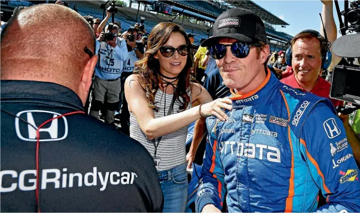  ??  ?? Scott Dixon celebrates his pole position for tomorrow morning’s Indy 500. The Kiwi is in good form with three podium finishes this year.