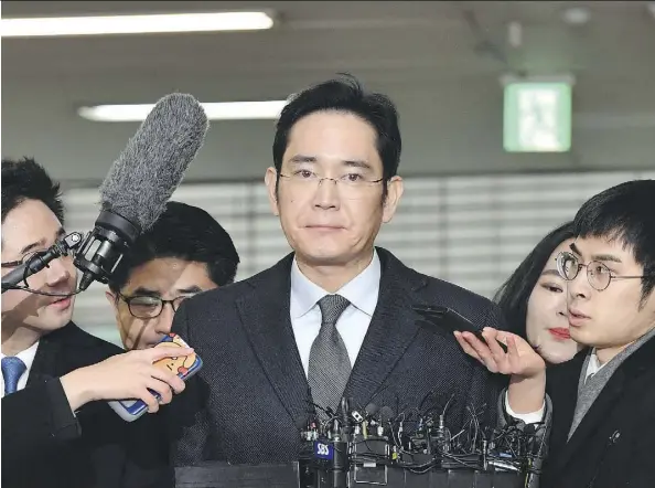  ?? JUNG YEON-JE/AP ?? Since the arrest of Lee Jae-yong, Samsung’s vice-chairman, over alleged corruption and bribery, shares in Samsung Electronic­s have been up more than six per cent. Market optimists view Lee’s trial as an opportunit­y for change that would benefit stock...