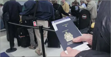  ?? PETER REDMAN/ POSTMEDIA NEWS FILES ?? Beginning next year, a Canadian passport will be valid for up to 10 years and feature an electronic chip.
