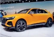  ??  ?? Tecnologia tedesca. Sopra, la Audi Q8 Concept, che introduce un nuovo linguaggio stilistico della marca dei Quattro anelli. Il modello definitivo arriverà a fine anno e offrirà tanto hi-tech a bordo. Sotto, la Bmw Serie 5 Touring, che nella sua nuova...