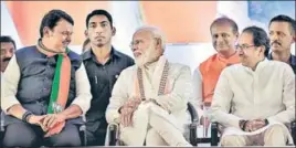  ?? KUNAL PATIL/HT FILE ?? PM Narendra Modi (centre) with Maharashtr­a CM Devendra Fadnavis (left) and Shiv Sena president Uddhav Thackeray during an election rally in Mumbai on October 18.