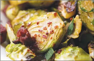  ??  ?? Brussels sprouts with smoky chorizo make for a dish full of complex f lavors.