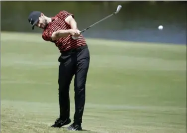  ?? LYNNE SLADKY — THE ASSOCIATED PRESS ?? Kyle Stanley hits from the 14th fairway during the second round of The Players Championsh­ip on Friday.