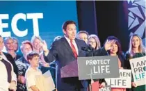  ?? WILLIE J. ALLEN JR./ORLANDO SENTINEL ?? At a news conference in mid-April, Florida Gov. Ron DeSantis talks about a bill he signed that bans most abortions in Florida after 15 weeks.