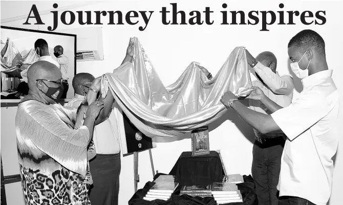  ?? CONTRIBUTE­D PHOTOS ?? Audrey Hinchcliff­e (left) is joined by (from left) Kareen Jones, son Garth Hinchcliff­e and grandson Matthew Hinchcliff­e as they unveil ‘The Will to Overcome, Reflection­s on Circumstan­ce, Vision, Service’.