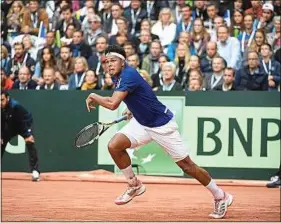  ??  ?? Jo-Wilfried Tsonga a ramené deux points à la France, ce week-end à Lille.