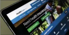  ?? ALEX BRANDON — THE ASSOCIATED PRESS FILE ?? Friday, Dec. 15 is the last day for procrastin­ators to enroll for subsidized private coverage in 39 states served by HealthCare.gov.