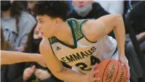  ?? AMY SHORTELL/THE MORNING CALL ?? Emmaus’ Dylan Darville had a career-high 28 points in a win over Pocono Mountain West on Friday night.