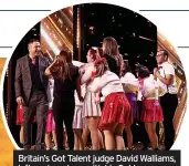  ?? ?? Britain’s Got Talent judge David Walliams, left, and on stage with his Golden Buzzer choice Born to Perform, above