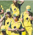  ?? Picture: SARAH REED ?? The Australian women walk off after the loss.