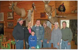  ?? CAROL ROLF/CONTRIBUTI­NG PHOTOGRAPH­ER ?? The men in the Bradford family enjoy hunting a variety of wild game. Family members are, back row, from left, Blake Bradford; Shauna Bradford; Skylar Bradford, 15; Bart Bradford; Barbara Bradford; and Jerry Bradford; and in front, Hunter Bradford, 7. “We hunt, and she cooks,” Jerry said, laughing, referring to the mounts on the wall and to his wife, Barbara.