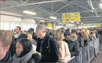  ??  ?? WAITING IN LINE: This picture was taken by commuter Becca Cawthorne at Clapham Junction