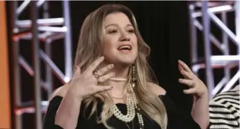  ?? WILLY SANJUAN/INVISION ?? Kelly Clarkson intends to help each contestant cultivate their natural abilities through the long competitio­n.