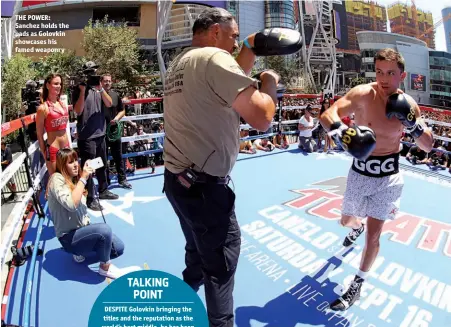  ??  ?? THE POWER: Sanchez holds the pads as Golovkin showcases his famed weaponry