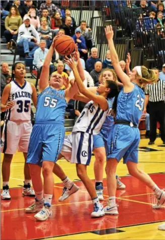  ?? AUSTIN HERTZOG — DIGITAL FIRST MEDIA ?? North Penn’s Brianna Hewlett (55) grabs a rebound in front of Cedar Crest’s Ariel Jones during the second half of their PIAA Class 6A first round game Friday at Lebanon.