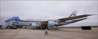  ?? STEPHAN SAVOIA — THE ASSOCIATED PRESS ?? In this Monday photo during a visit to the “Air Force One Experience,” a full-sized 747 replica of Air Force One which is now open to the public sits on a tarmac in North Kingstown, R.I.