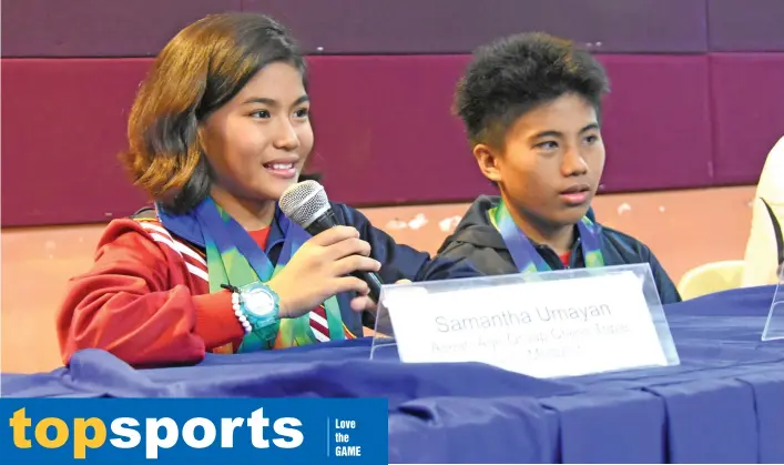  ??  ?? ALL PRAISES TO PAPA. Gold medalists Samantha Umayan, left, and brother Gabriel John thank their father for funding their trip to the just-concluded 18th Asean Age-Group Chess Championsh­ips in Malaysia. MARK PERANDOS