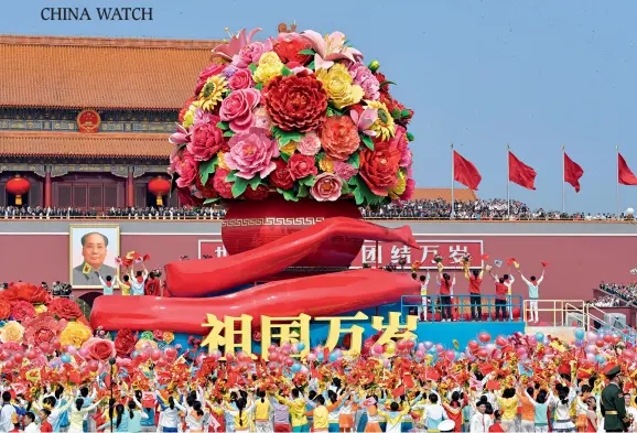  ??  ?? Paraders in a “Long Live My Motherland” themed formation cheering the state leaders among the mass pageantry on the 2019 National Day at Tian’anmen Square in Beijing.