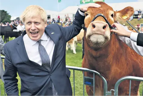  ?? ?? Boris Johnson attends the Royal Cornwall Show in Wadebridge. The Prime Minister is set to unveil the country’s first food strategy for 75 years next week