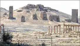  ?? ASSOCIATED PRESS ?? The Roman-era ruins in the Syrian city of Palmyra have earned it the nickname“Bride of the Desert.”Islamic State fighters have destroyed ancient temples in Iraq, calling them blasphemou­s, and there is concern they will do the same in Palmyra.