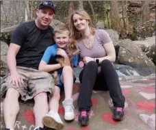  ?? PHOTO FROM GOFUNDME PAGE ?? From left, Josh Knarr, Preston Dray and Pam Snyder. Pam and her son Preston died in floodwater­s on Thursday. This family photo was posted on a GoFundMe page set up by friends of the family.