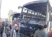  ?? SANTOSH KUMAR/H ?? ■ Maoists set seven vehicles — three buses, three tractors, and a car — ablaze in Aurangabad on Saturday.