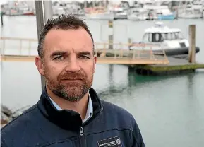  ?? PHOTO: FAIRFAX NZ ?? Nelson Marlboroug­h MPI fisheries chief compliance officer Anthony Little, with the new patrol vessel Kiwa in the background.