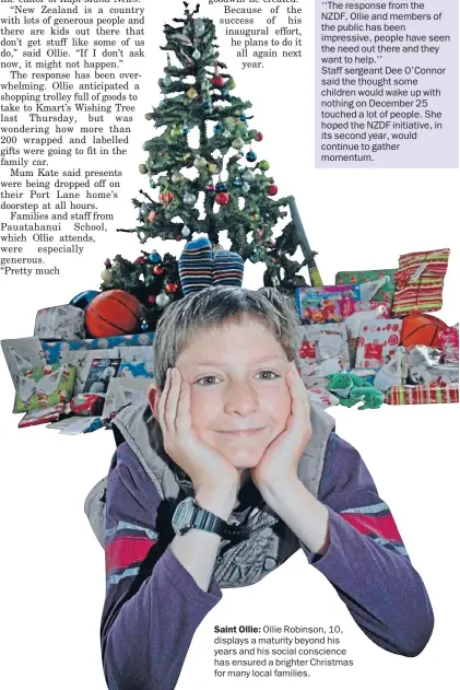  ??  ?? Saint Ollie: Ollie Robinson, 10, displays a maturity beyond his years and his social conscience has ensured a brighter Christmas for many local families.