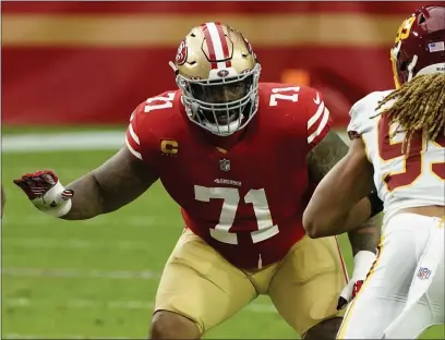  ?? RICK SCUTERI — THE ASSOCIATED PRESS, FILE ?? The 49ers locked up their biggest potential free agent for the long term by agreeing to give star left tackle Trent Williams, above, the richest contract ever for an offensive lineman. Williams’ agents say the deal will pay Williams $138.1million over the next six years.