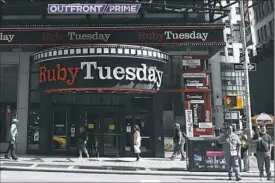  ??  ?? A Ruby Tuesday restaurant in Times Square in New York City.