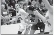  ?? NWA Democrat-Gazette/CHARLIE KAIJO ?? Fort Smith Northside forward Sara Bershers (left) looks to throw a pass to a teammate Saturday during the Lady Grizzlies’ 64-62 victory over Fayettevil­le in the Class 6A state tournament semifinals in Centerton.