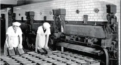  ?? Slab cakes just out of the ovens at Lavery’s, in the 1950s, above ??