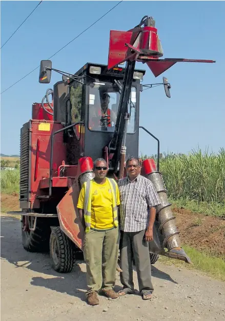  ?? Photo: FSC ?? Chandra Ratnam (right) with two of his mechanical harvester Operators.