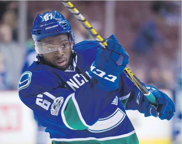  ?? GERRY KAHRMANN/PNG FILES ?? The Canucks hope Trent Cull, below, can work his magic in Utica and turn offensivel­y gifted Jordan Subban into an NHL-calibre defenceman. ‘I see him as a guy with such great skill and such great speed,’ Cull said. ‘He moves the puck really well.’