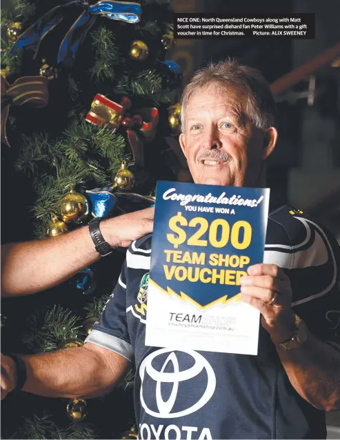  ?? NICE ONE: North Queensland Cowboys along with Matt Scott have surprised diehard fan Peter Williams with a gift voucher in time for Christmas. Picture: ALIX SWEENEY ??