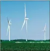  ?? WALKER PICKERING/THE NEWYORK TIMES ?? Completed turbines are seen at awind farmunder constructi­on in Milligan, Neb., by EDF, a French energy company.