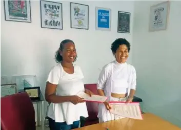  ?? DR ?? Angélica Mayomona, directora do Festeca (à esquerda) e Tatiana Henriques assinaram os acordos